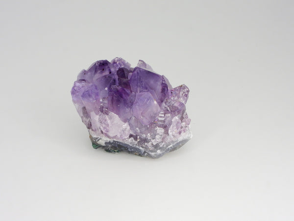 Beautiful Amethyst cluster with inclusions. Back view