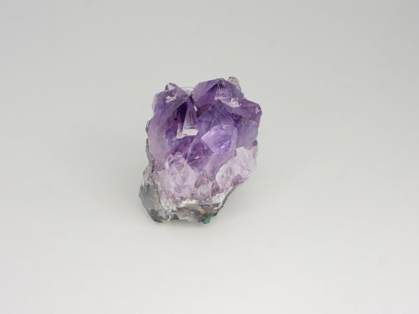 Beautiful Amethyst cluster with inclusions. Other side view