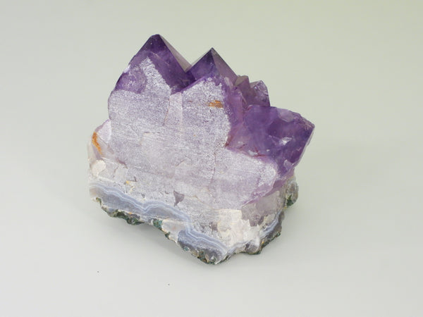 Beautiful Amethyst cluster with inclusions. Back view