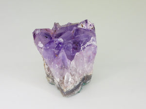 Beautiful Amethyst cluster with inclusions. Close up