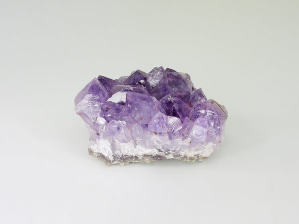 Beautiful Amethyst cluster with inclusions. Back view