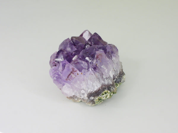 Beautiful Amethyst cluster with inclusions. Other side view