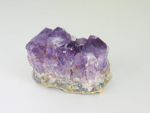 Beautiful Amethyst cluster with inclusions. Front view