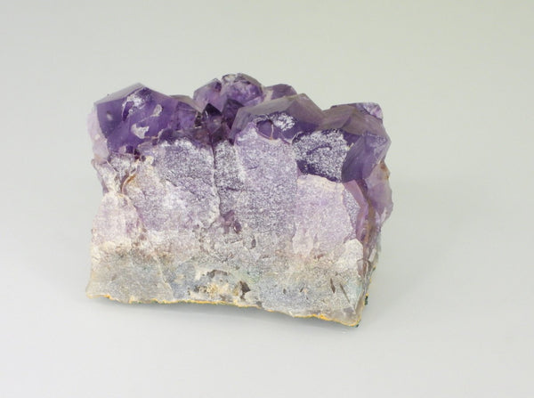 Beautiful Amethyst cluster with inclusions. Back view