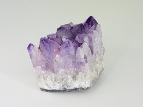 Beautiful Amethyst cluster with inclusions. Front view