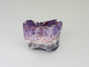 Beautiful Amethyst cluster with inclusions. Front view