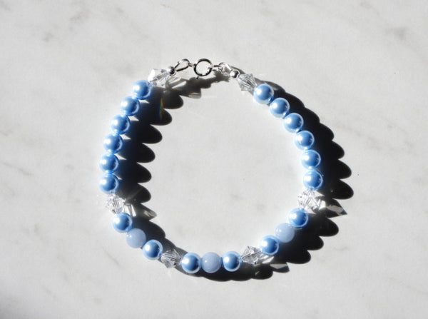 Blue princess bracelet with Swarovski pearls, swarovski crystals, angelite beads and sterling silver findings. Top view