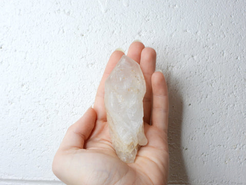 Himalayan Clear Quartz natural point in someone's hand