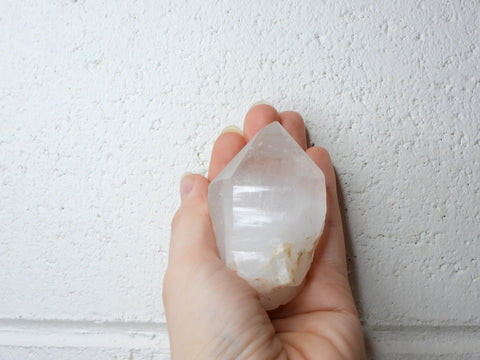 Himalayan Clear Quartz natural point in someone's hand