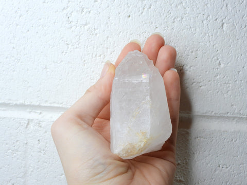 Himalayan Clear Quartz natural point in someone's hand