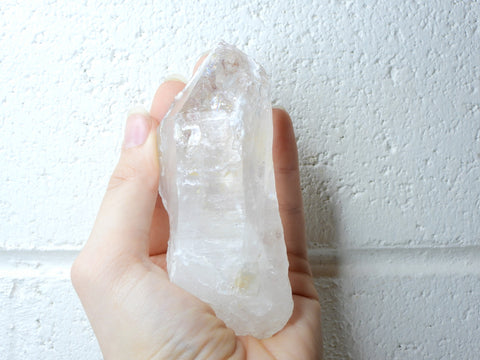 Himalayan Clear Quartz natural point in someone's hand