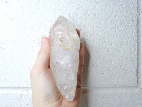 Himalayan Clear Quartz natural point in someone's hand